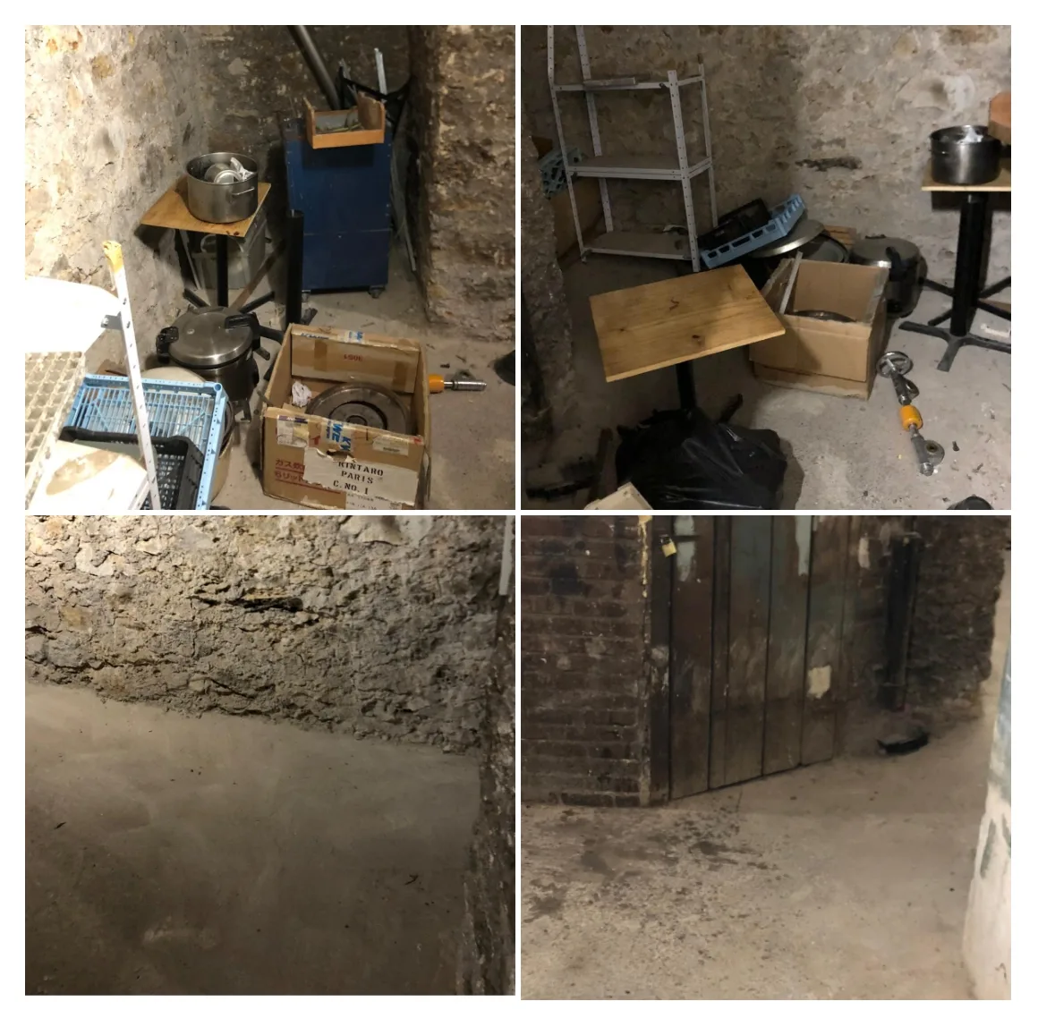 Cave en cours de débarras avec cartons et objets entreposés avant évacuation